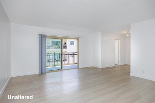 A room with unaltered flooring and a sliding glass door.