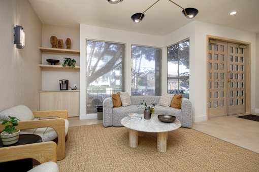a living room with a couch and a coffee table