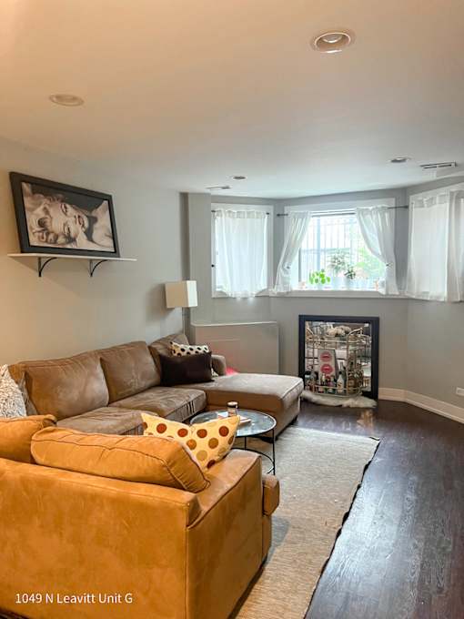 a living room with a couch and a chair