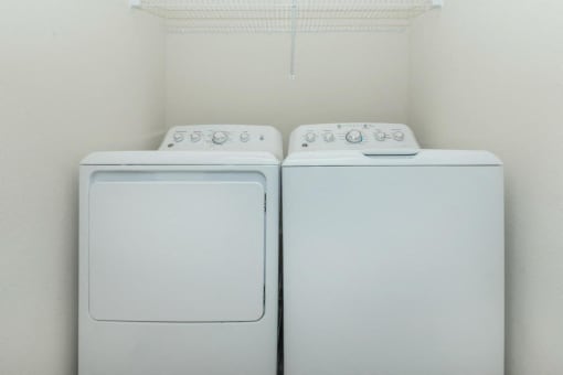 a washer and dryer in the laundry room of a home