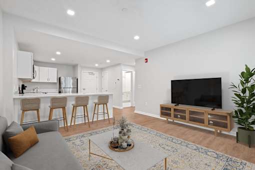 Living Room With TV at Roosevelt Commons Apartments, Philadelphia