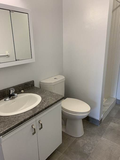 a small bathroom with a toilet and a sink