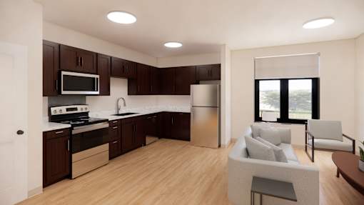 A modern kitchen with dark brown cabinets and a stainless steel refrigerator.