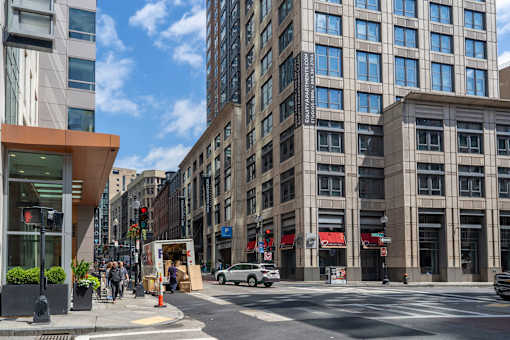 Neighborhood photo with sidewalks and tall buildings