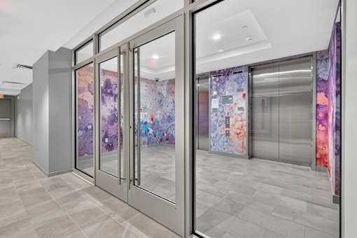 Elevators with colorful modern art walls