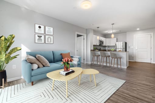 a living room with a couch and a table