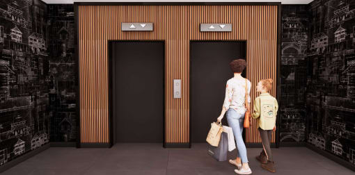 a woman and a child standing in front of two elevator doors