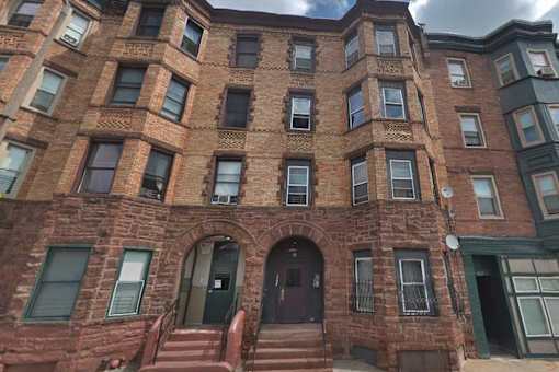 A brick apartment building