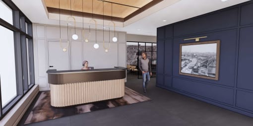 a reception desk in a lobby of a building with a person walking