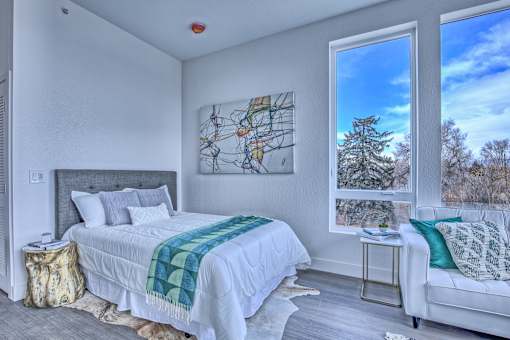 Bedroom with a Bed at Sloan's Place Apartments, Denver, Colorado