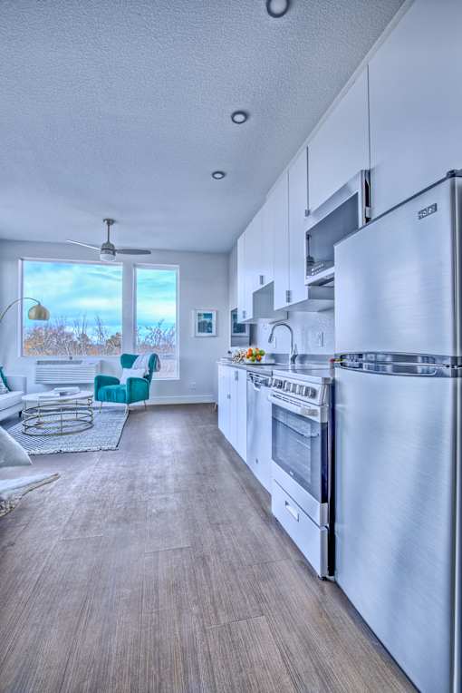 Kitchen with Wooden Floor at Sloan's Place Apartments, Denver, 80214