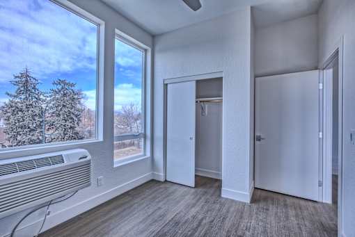 Room with a Wall Heater at Sloan's Place Apartments, Denver, Colorado