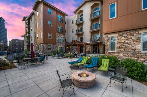 Outdoor Firepit Patio at Peregrine Place Apartments, Denver, CO