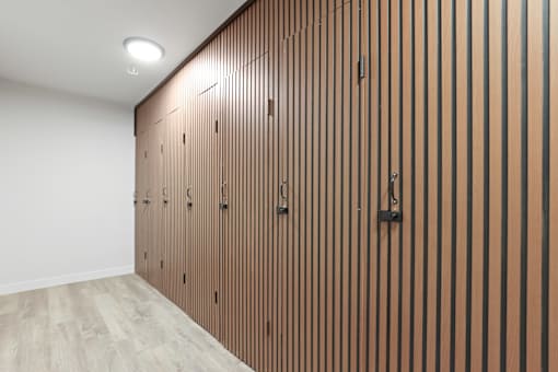 A room with a brown striped wall and a white ceiling.