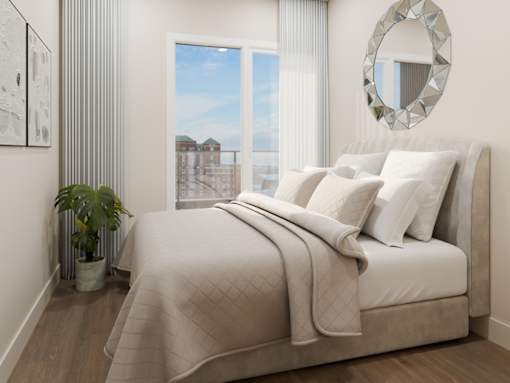 A bedroom with a large bed and a mirror on the wall.