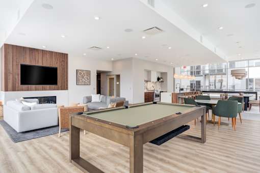Community room pool table and a tv area