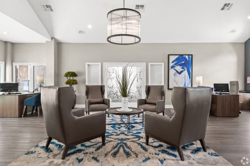 a common room at the enclave at woodbridge apartments in sugar land, tx