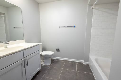 a bathroom with a toilet sink and bathtub