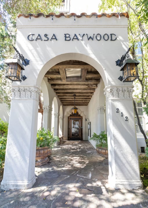 the archway of the casa baywood hotel entrance