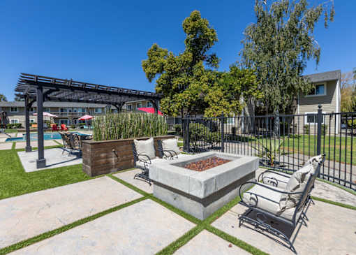 the preserve at ballantyne commons community patio with firepit and chairs