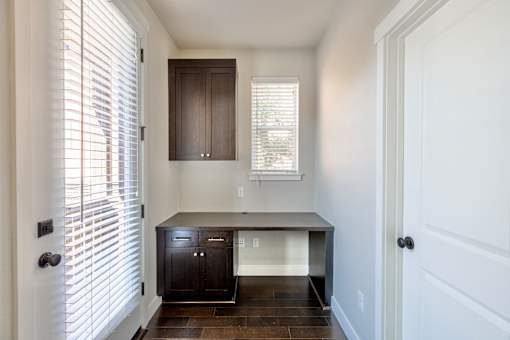 a kitchen with a counter top and a window