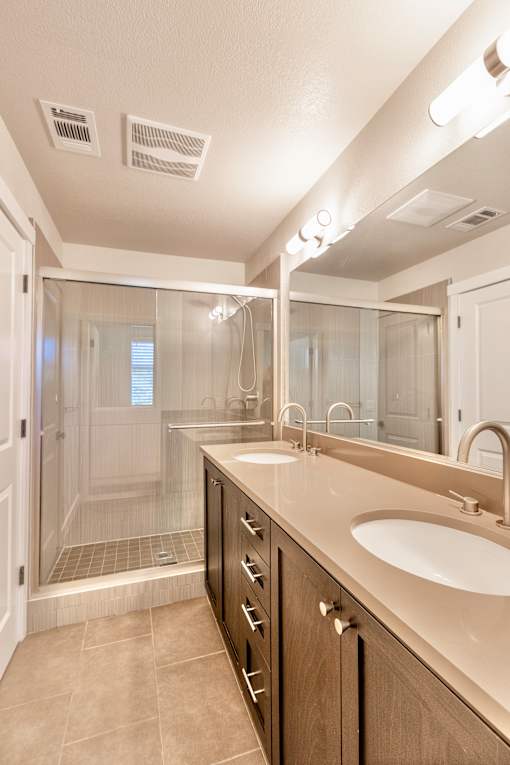 the preserve at ballantyne commons bathroom with sink and shower