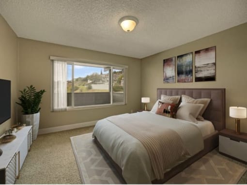 a bedroom with hardwood floors and a window