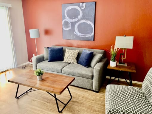 a living room with a couch and a coffee table