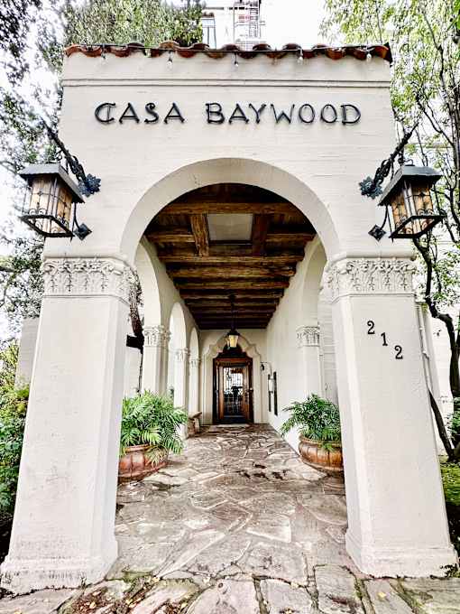 the archway of the casa baywood hotel entrance
