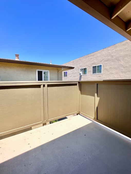 a view of the back of the house from the patio
