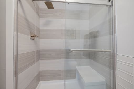 Brand new walk in shower, with bench, in select homes at Evergreens at Columbia Town Center