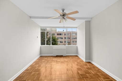 Bedroom with fan at Connecticut Park Apartments, Washington, DC, 20008