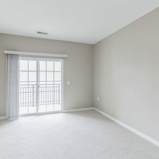 Carpeted Living Area at Evergreens at Smith Run, Virginia, 22401