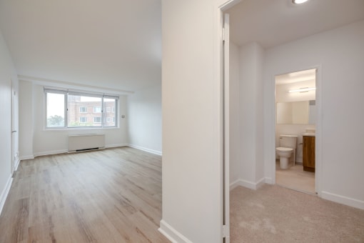 Renovated studio living space, including closet, and bathroom