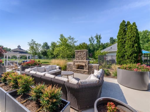 Relaxing Patio Area with Custom Fireplaceat Evergreens at Smith Run, Fredericksburg, VA