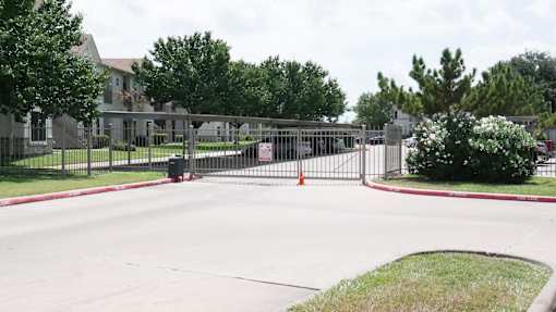 A gated entrance to a residential area.