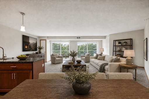 A modern living room with a wooden table and a couch.