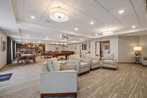 A spacious waiting room with a variety of seating options.