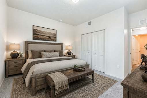 Spacious bedroom with rustic wood furniture at Silver Ridge Apartments, Meridian