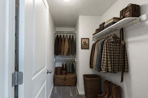 Walk-in closet with organized shelving and storage at Silver Ridge Apartments, Meridian, ID