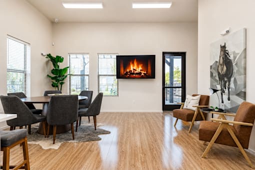 Clubhouse lounge with fireplace and seating at Silver Ridge Apartments, Meridian, 83642