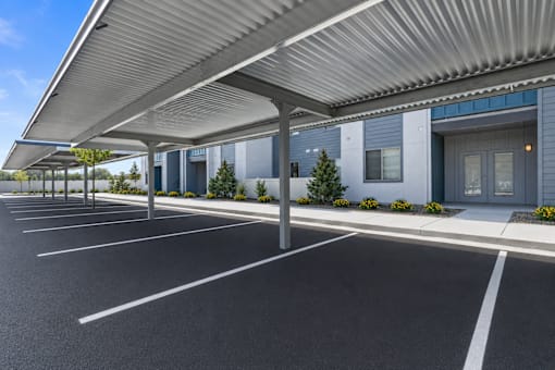 Covered parking area with metal canopy at Silver Ridge Apartments, Meridian