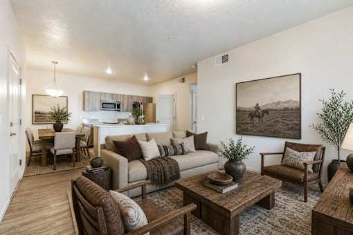 Open living room with wood accents and artwork at Silver Ridge Apartments, Meridian, ID