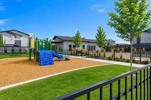 Playground with slide and fitness court at Silver Ridge Apartments, Idaho