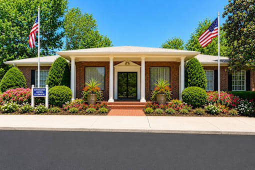 Information center and clubhouse entrance with brick facade at Stonetree Apartments, East Point, GA 30344