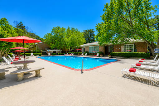 Resort style swimming pool with sun loungers at Stonetree Apartments, East Point, 30344