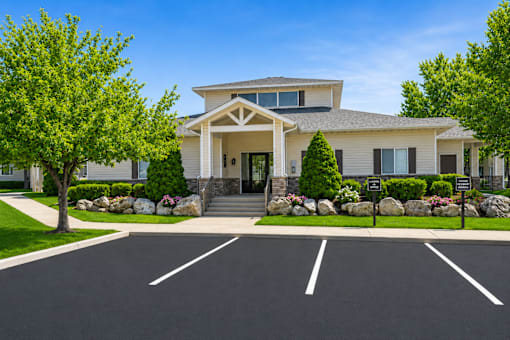 A house with a driveway in front of it.