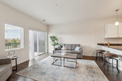 a living room with a couch and a table