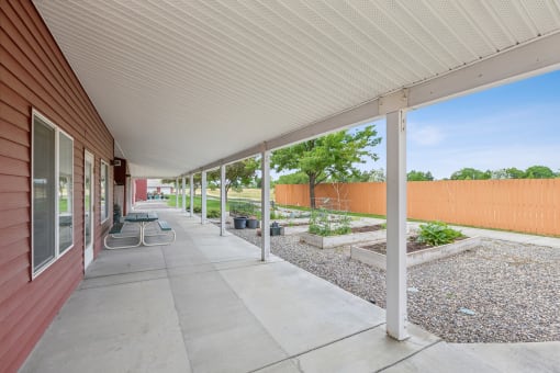 the preserve at ballantyne commons spacious covered patio with views of the community garden