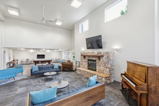 a living room with a couch and a table and a television